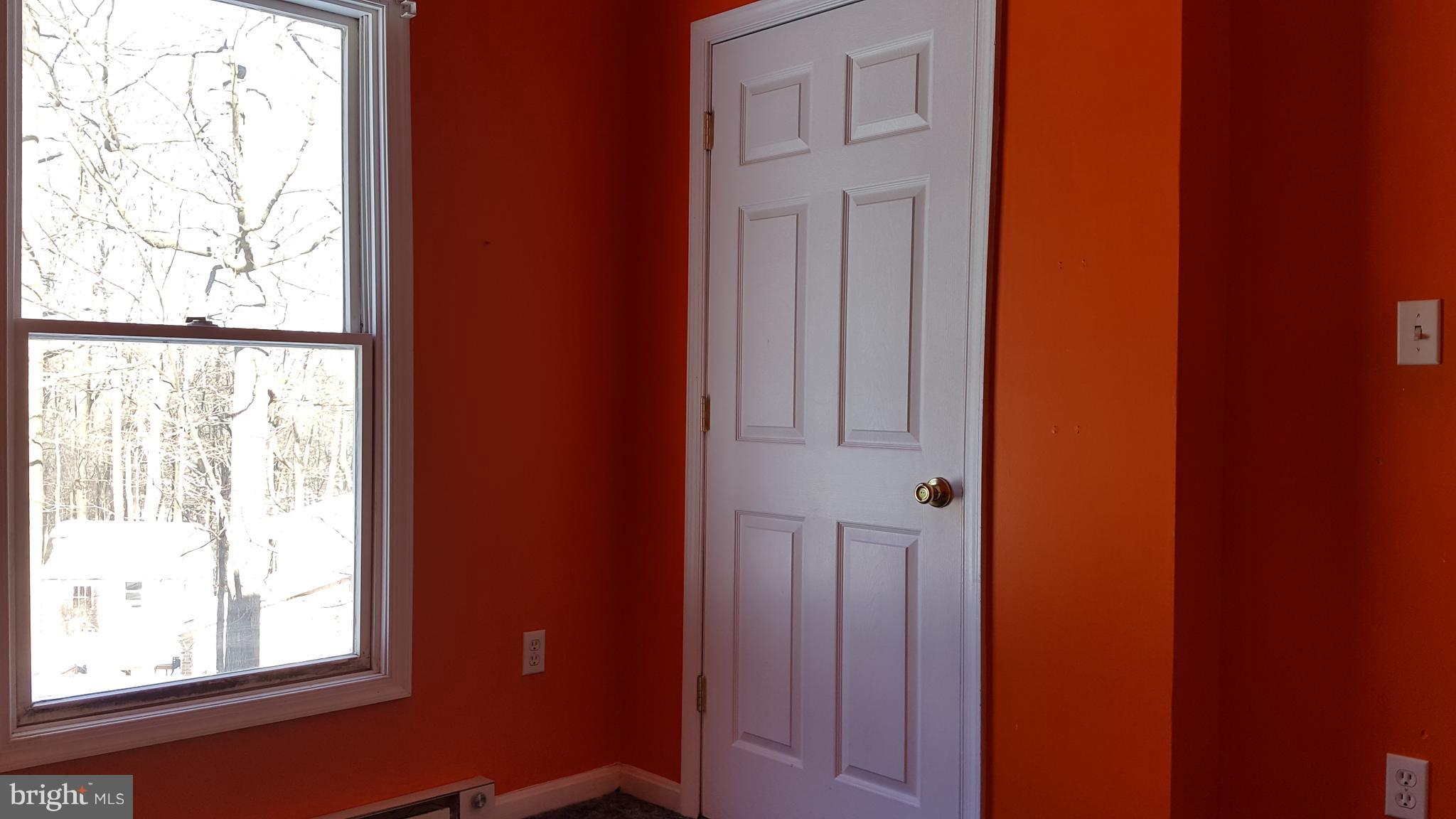 24581 Hells Delight Road Smithsburg, MD 21783 - Photo 18 of 22 a door with a window in a room