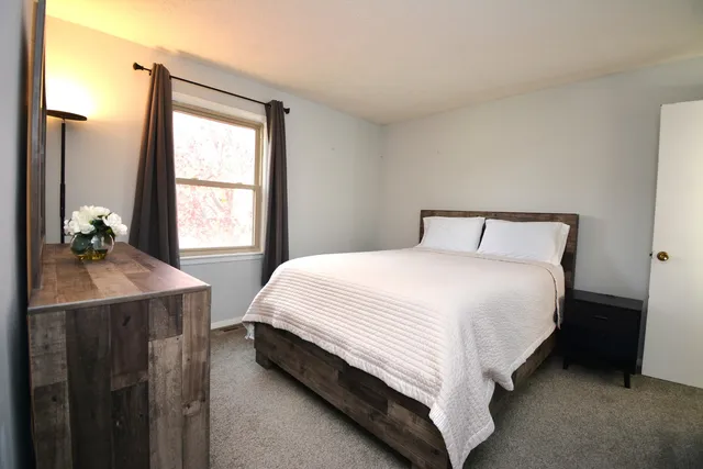 a workspace with furniture and a window