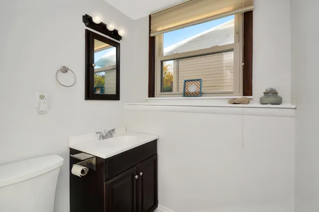 a view of a livingroom with furniture and a fireplace