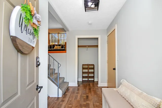 a living room with furniture and a table