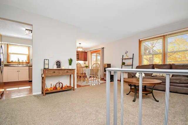 a kitchen with a refrigerator stove and sink