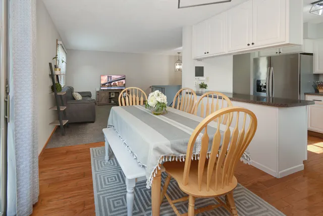 a view of balcony with wooden floor