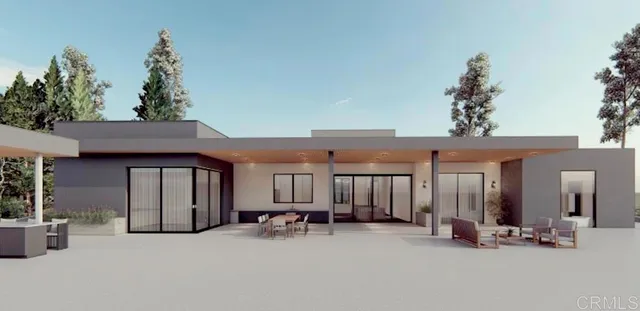 an outdoor space with patio furniture and a fireplace