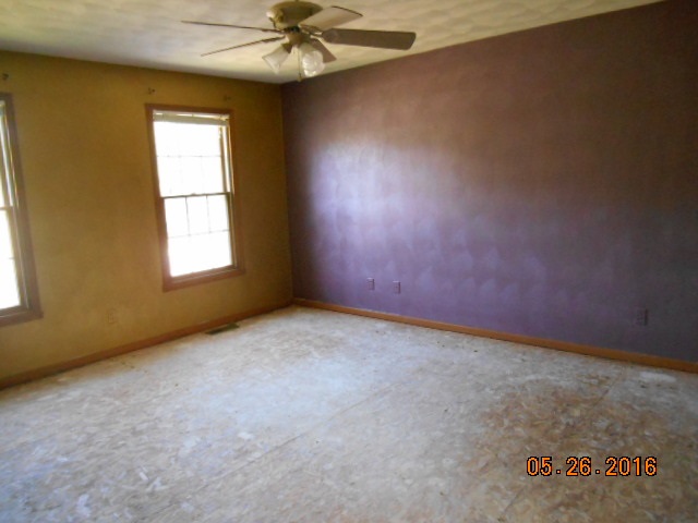 938 Lake Summerset Road Davis, IL 61019 - Photo 12 of 25 an empty room with a window