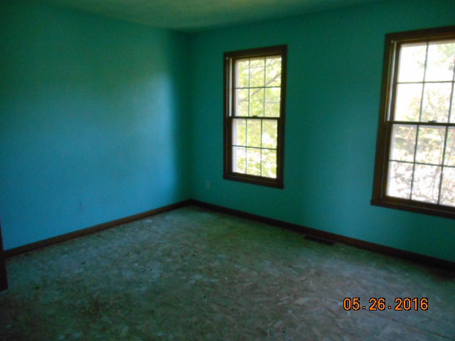 938 Lake Summerset Road Davis, IL 61019 - Photo 18 of 25 an empty room with a window