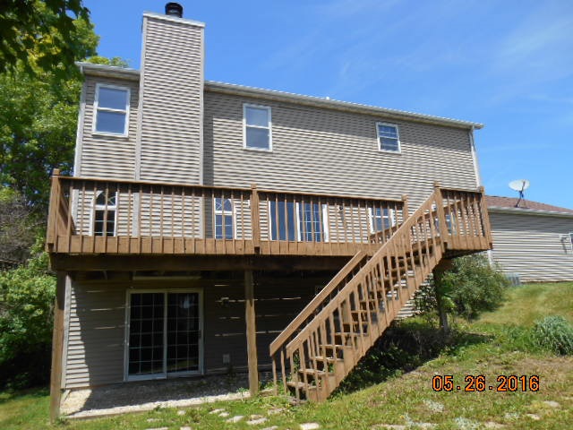 938 Lake Summerset Road Davis, IL 61019 - Photo 2 of 25 a front view of a house with balcony