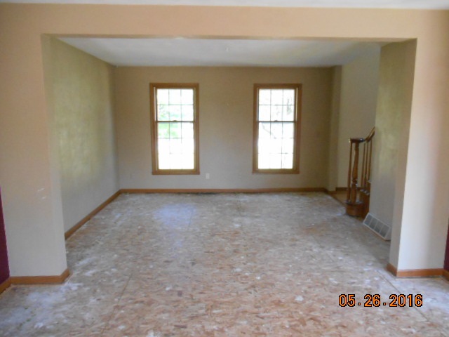 938 Lake Summerset Road Davis, IL 61019 - Photo 5 of 25 an empty room with windows