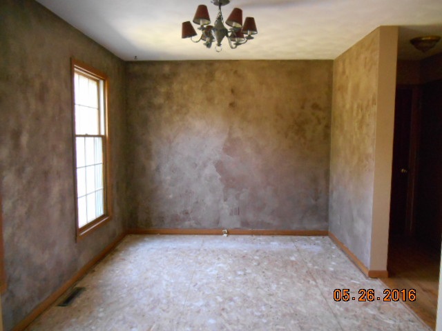 938 Lake Summerset Road Davis, IL 61019 - Photo 10 of 25 a view of an empty room with a window