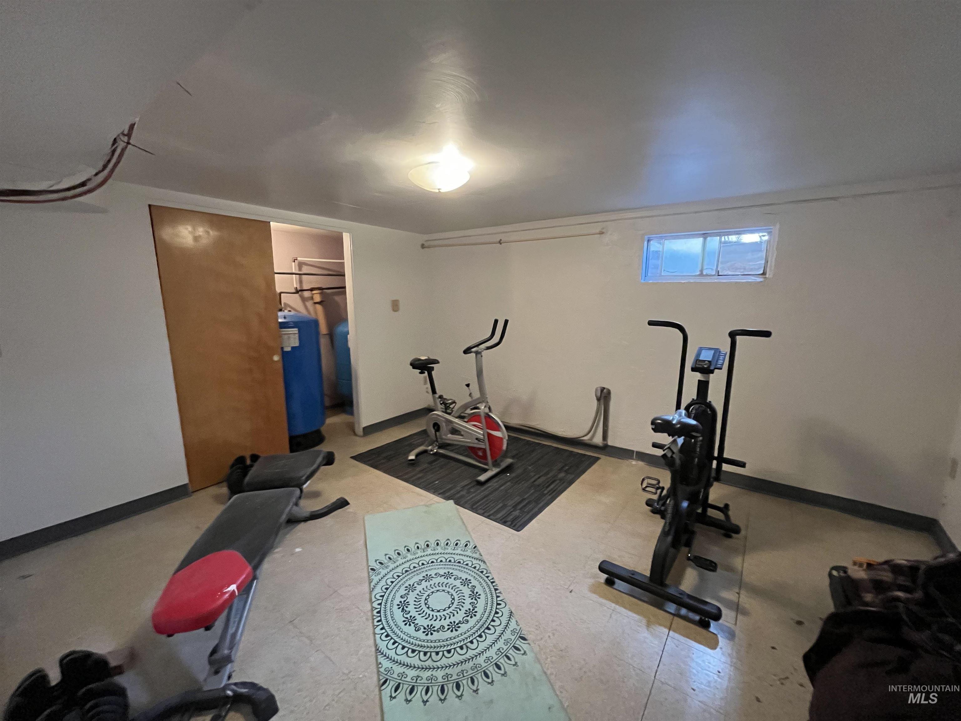 1048 Reynolds Road Princeton, ID 83857 - Photo 16 of 41 Storage holds the water heater, with water filter and pressurized tank. One pressurized tank and soft water are not connected.