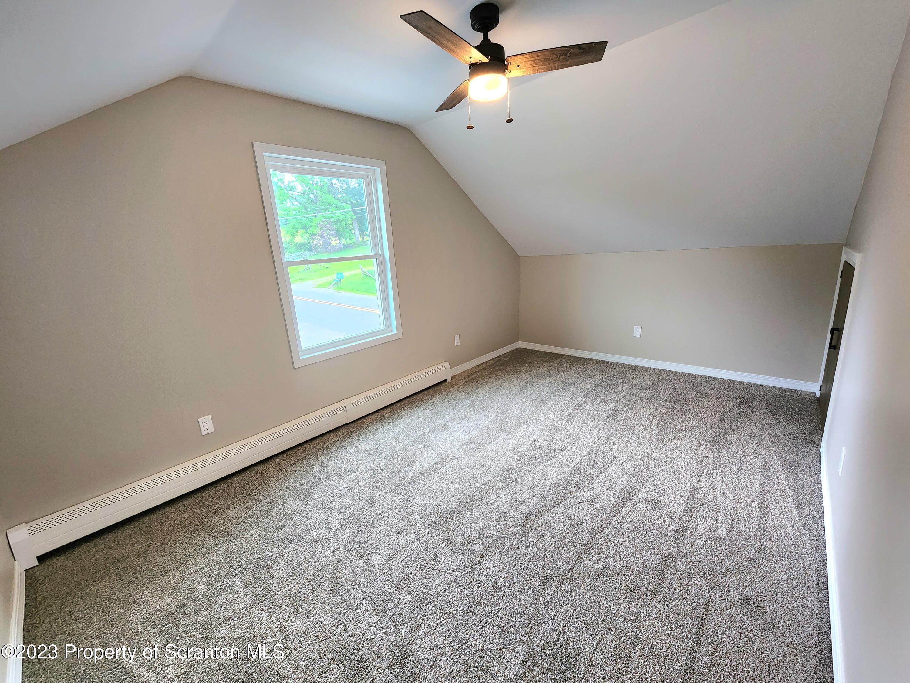 257 Maple Drive Dalton, PA 18414 - Photo 18 of 31 wooden floor in an empty room with a window