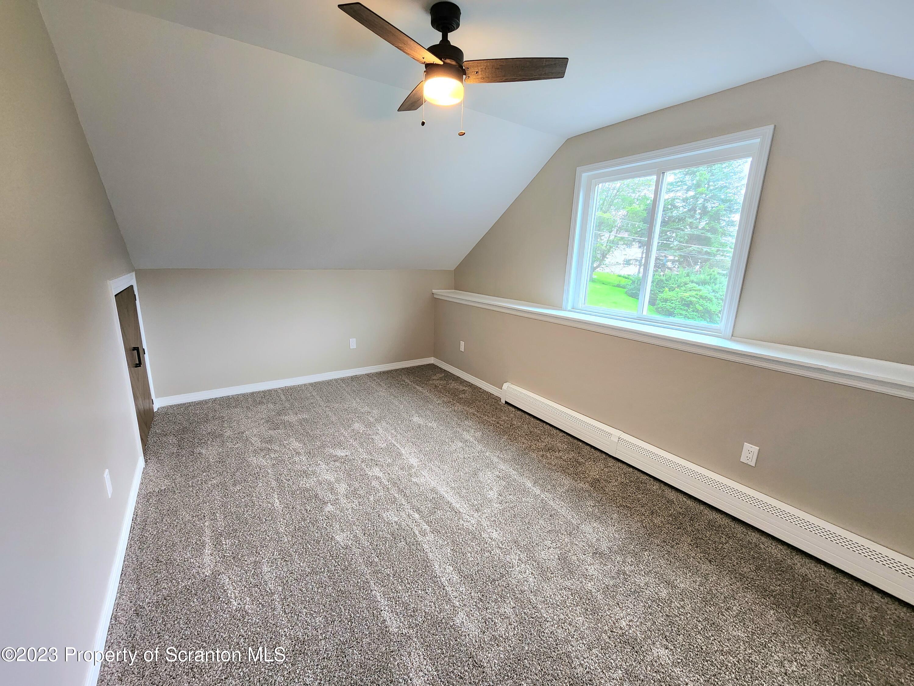 257 Maple Drive Dalton, PA 18414 - Photo 19 of 31 wooden floor in an empty room with a window
