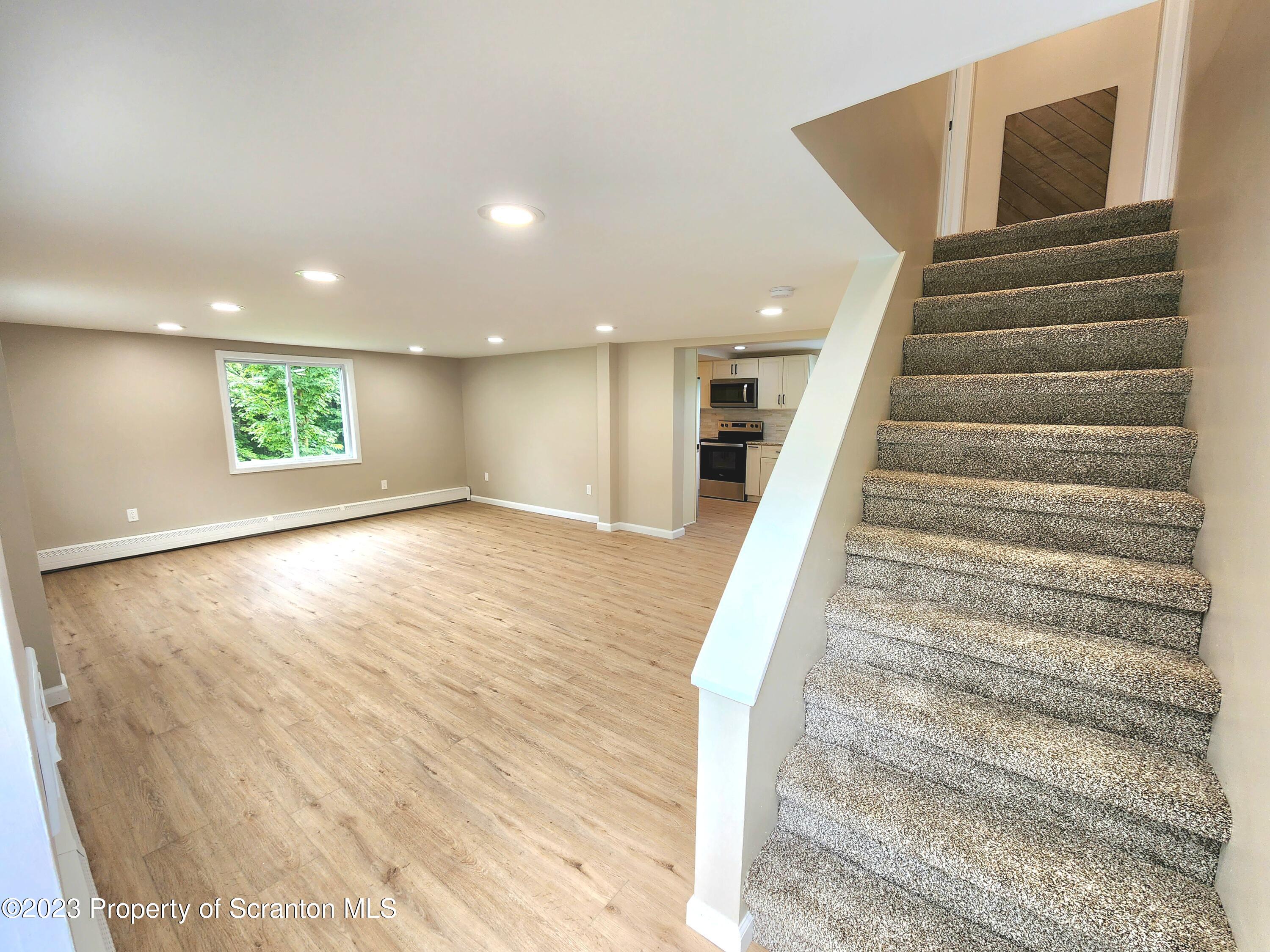 257 Maple Drive Dalton, PA 18414 - Photo 4 of 31 a view of entryway with wooden floor
