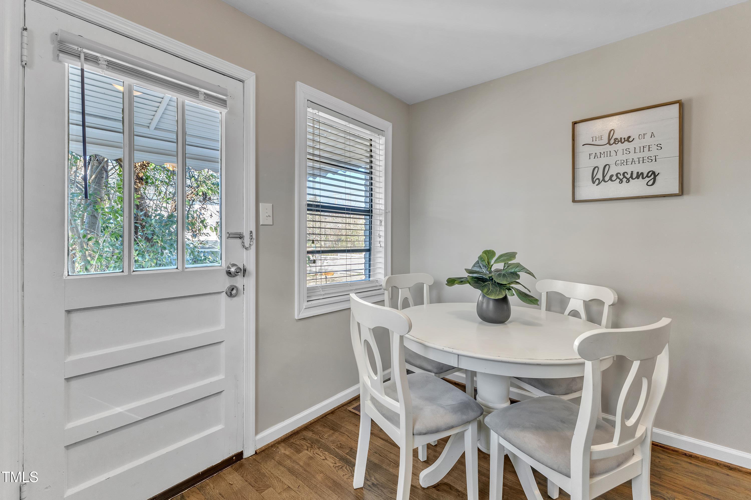 602 Quarry Street Raleigh, NC 27601 - Photo 12 of 49 a view of a dining room with furniture and a window