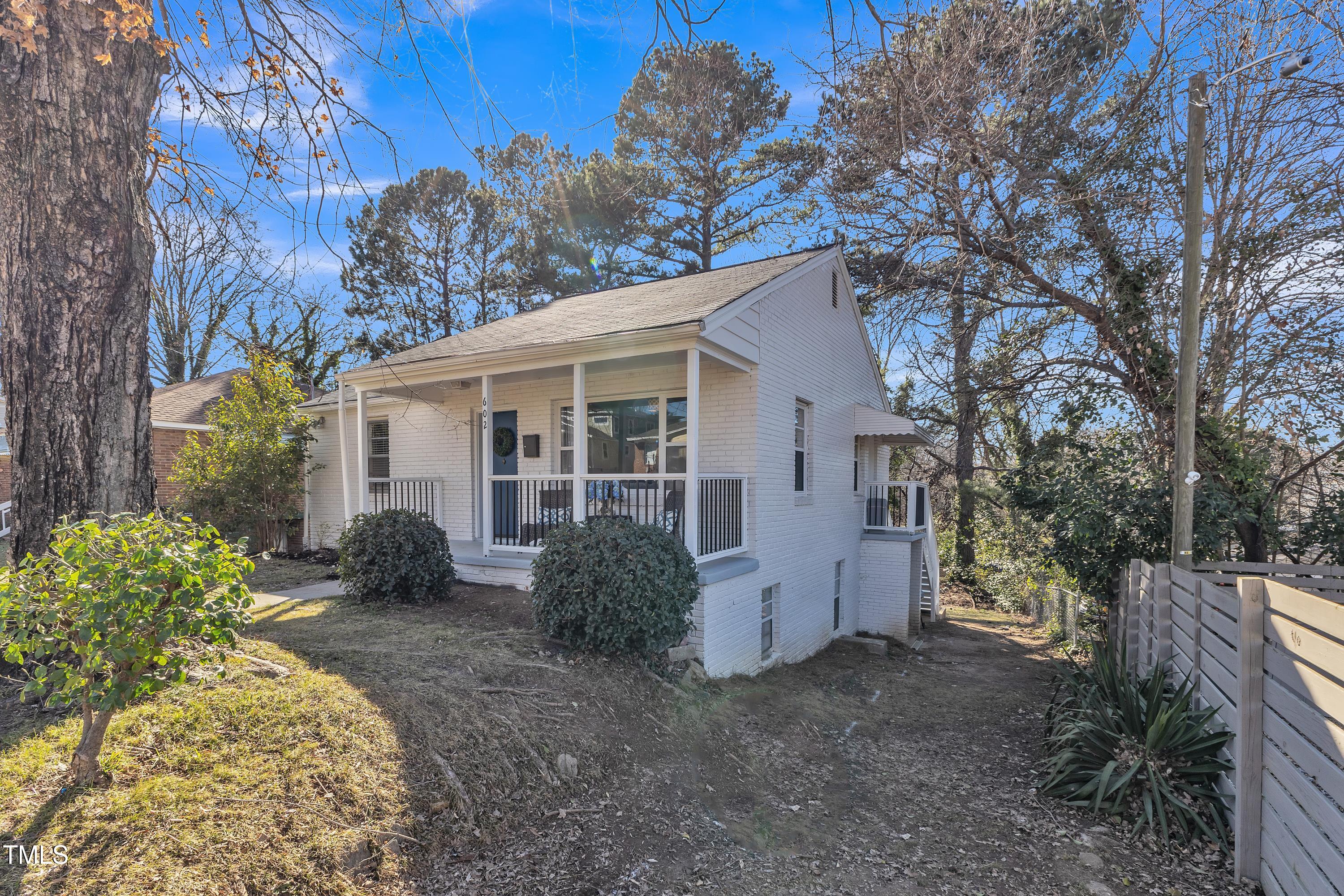 602 Quarry Street Raleigh, NC 27601 - Photo 2 of 49 a view of a house with a yard