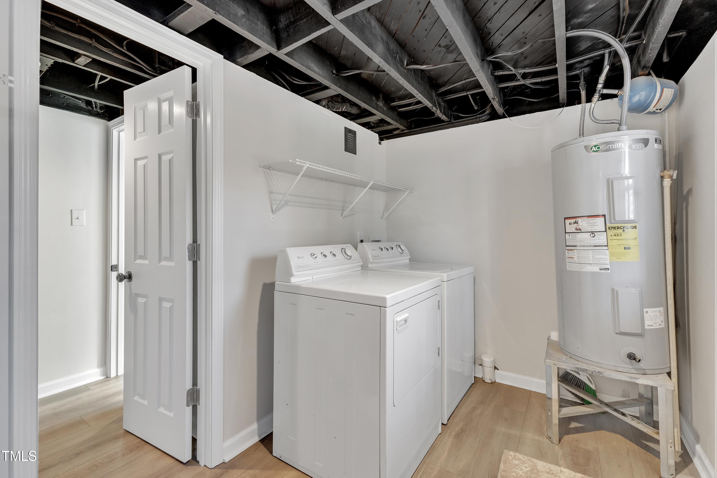 602 Quarry Street Raleigh, NC 27601 - Photo 22 of 49 a utility room with dryer and washer