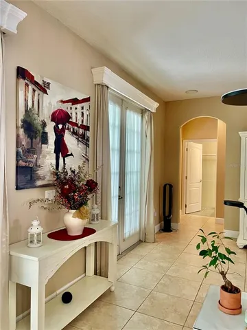 a view of living room with furniture and flower pot