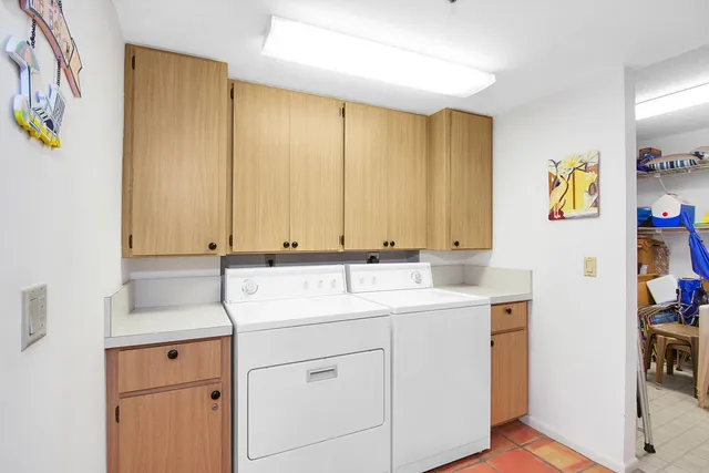 a view of cabinets with wooden floor