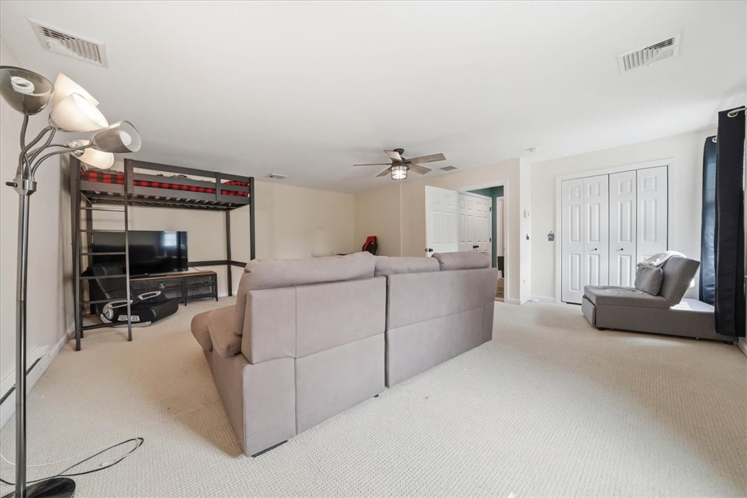 26 Davis Circle Warwick, RI 02886 - Photo 23 of 50 This is a fantastic bonus space and one of the home's most versatile rooms. Since it's located above the garage, it's ideal as a private guest suite, oversized 4th bedroom, media room, playroom, teen retreat, home office, or second family room.