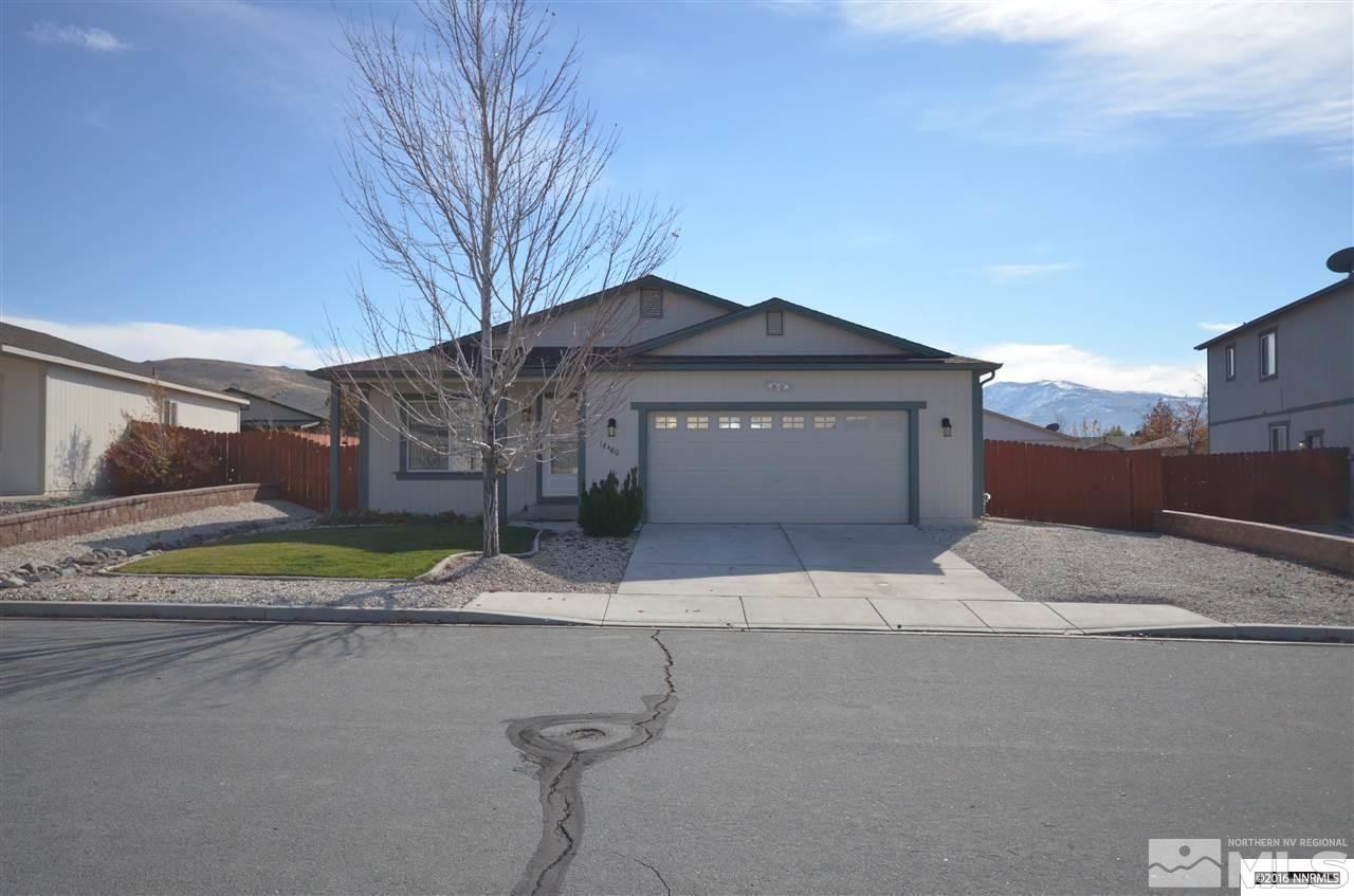 18480 Datewood Court Reno, NV 89508 - Photo 1 of 1 a front view of a house with a yard and garage