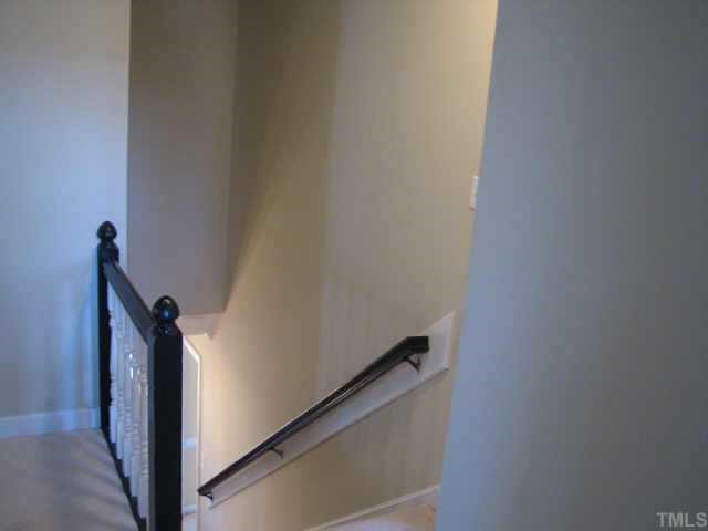 2417 Basil Drive Raleigh, NC 27612 - Photo 12 of 12 a view of a hallway with storage