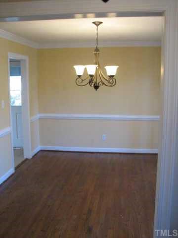 2417 Basil Drive Raleigh, NC 27612 - Photo 4 of 12 a view of an empty room