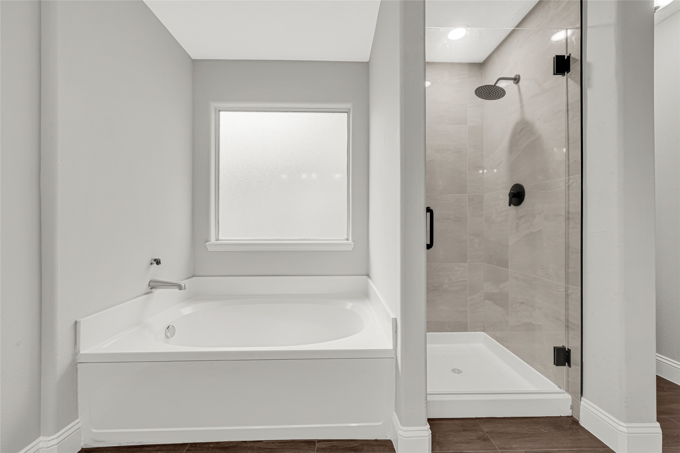 10406 Bentondale Lane Houston, TX 77075 - Photo 12 of 27 a white bath tub sitting next to a shower