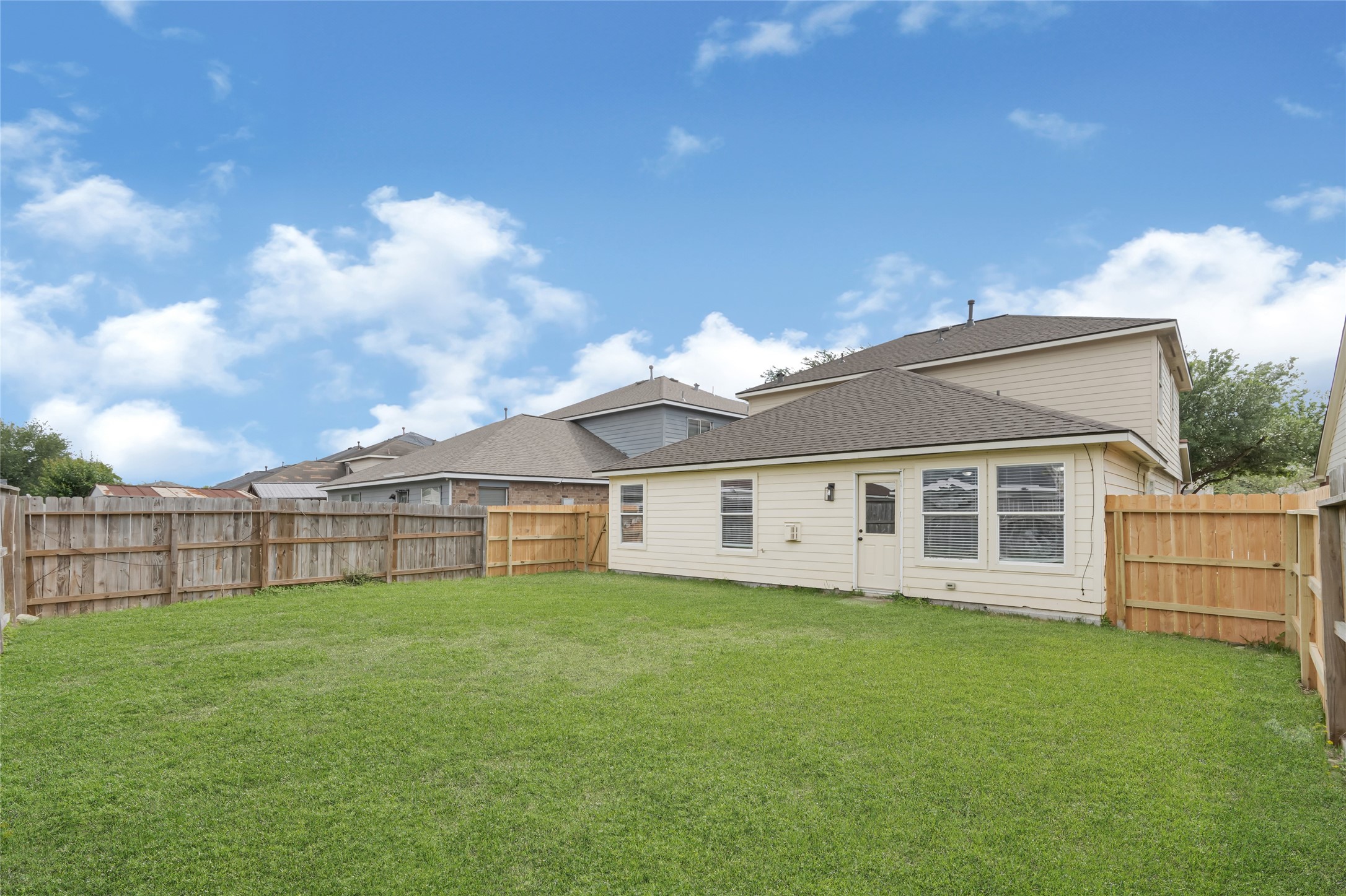10406 Bentondale Lane Houston, TX 77075 - Photo 26 of 27 front view of a house with a yard