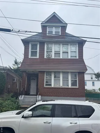 a view of a house with a swimming pool