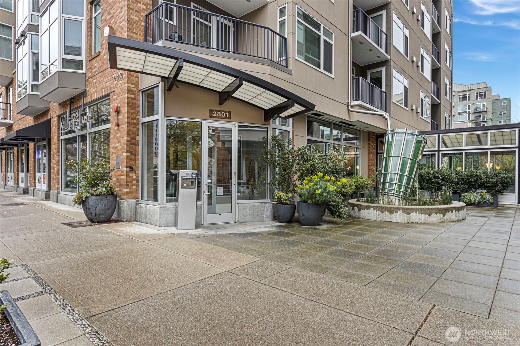 2801 1st Avenue, Unit 612 Seattle, WA 98121 - Photo 20 of 25 a view of a building with sitting area