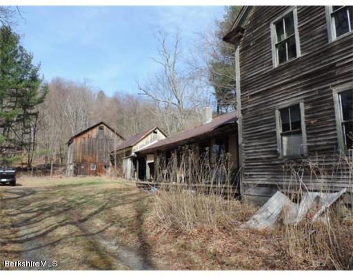 19 Dodge Road Buckland, MA 01339 - Photo 2 of 8 a view of house with trees in the background