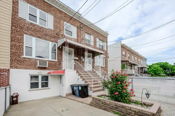a front view of a multi story residential apartment building