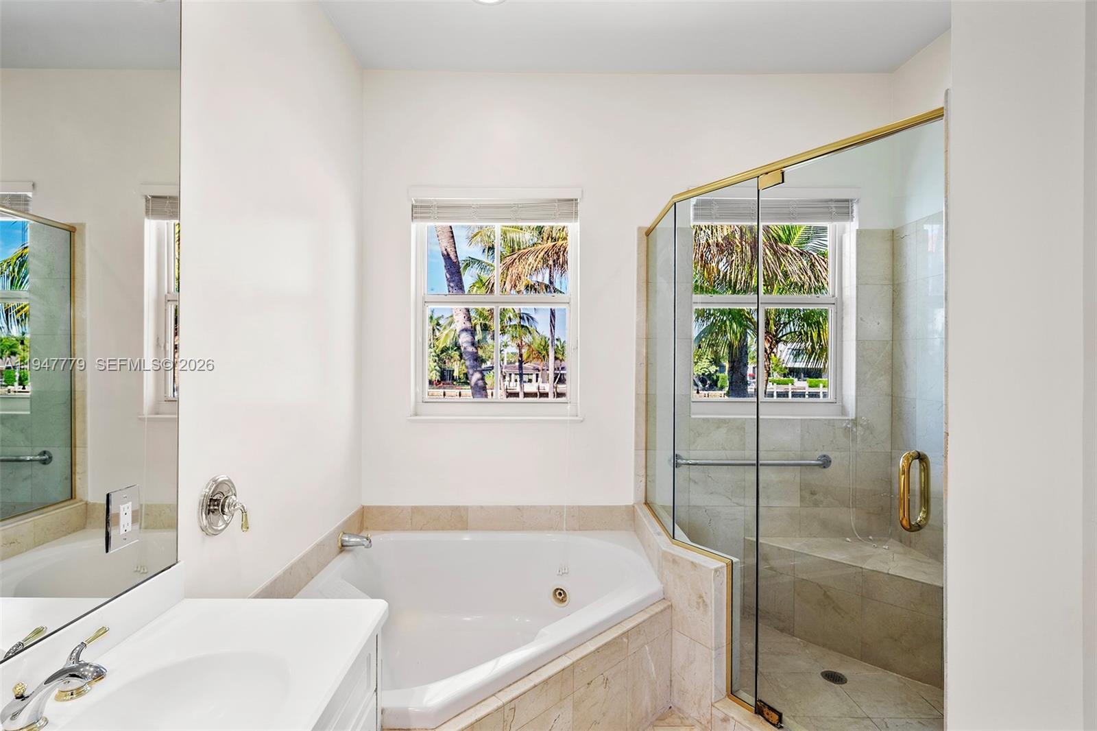 1500 Shoreline Way, Unit 1500 Hollywood, FL 33019 - Photo 40 of 54 a bathroom with a bathtub and a shower