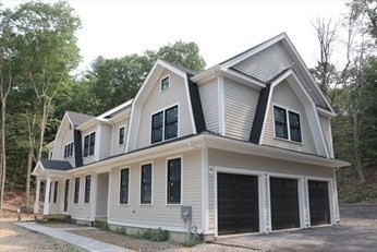 45 Widow Rights Lane Sudbury, MA 01776 - Photo 18 of 23 a view of a white house with large windows