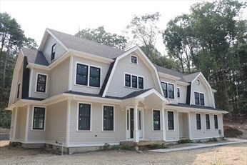 45 Widow Rights Lane Sudbury, MA 01776 - Photo 20 of 23 a front view of a house with a garden