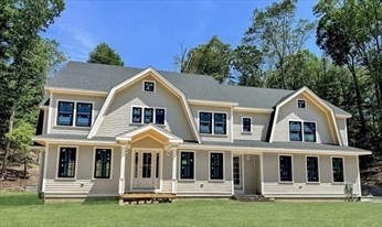 45 Widow Rights Lane Sudbury, MA 01776 - Photo 22 of 23 a front view of a house with a garden