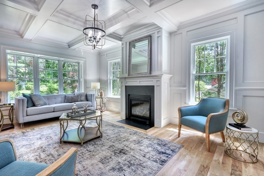 45 Widow Rights Lane Sudbury, MA 01776 - Photo 6 of 23 a living room with furniture and a fireplace