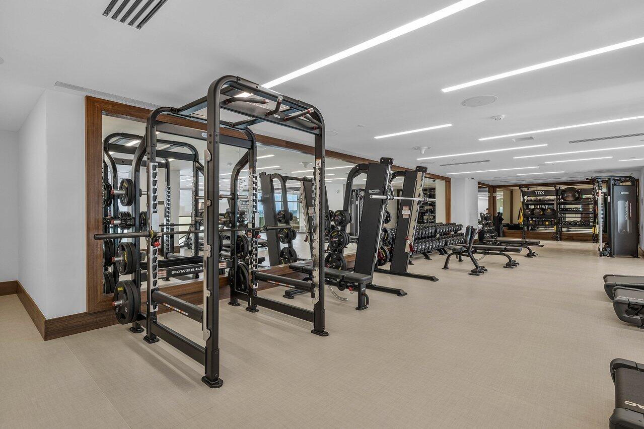 220 Southeast Mizner Boulevard, Unit 810 Boca Raton, FL 33432 - Photo 35 of 39 a view of a room with gym equipment
