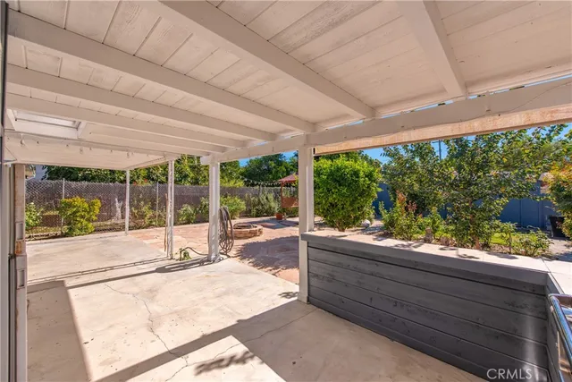 a room with window and pool table