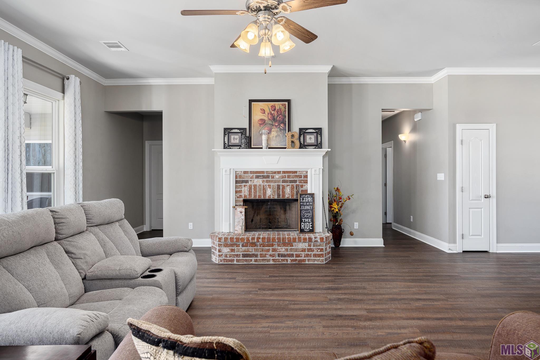 11486 Tannis Rd. St. Amant, LA 70774 - Photo 5 of 27 Wood Burning Fireplace