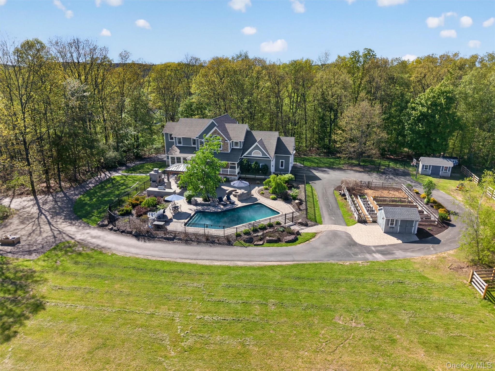 2 White Horse Road Middletown, NY 10940 - Photo 3 of 47 Nestled on an amazing 12.7 acres, this home provides ample space for entertaining and recreation both inside and out!