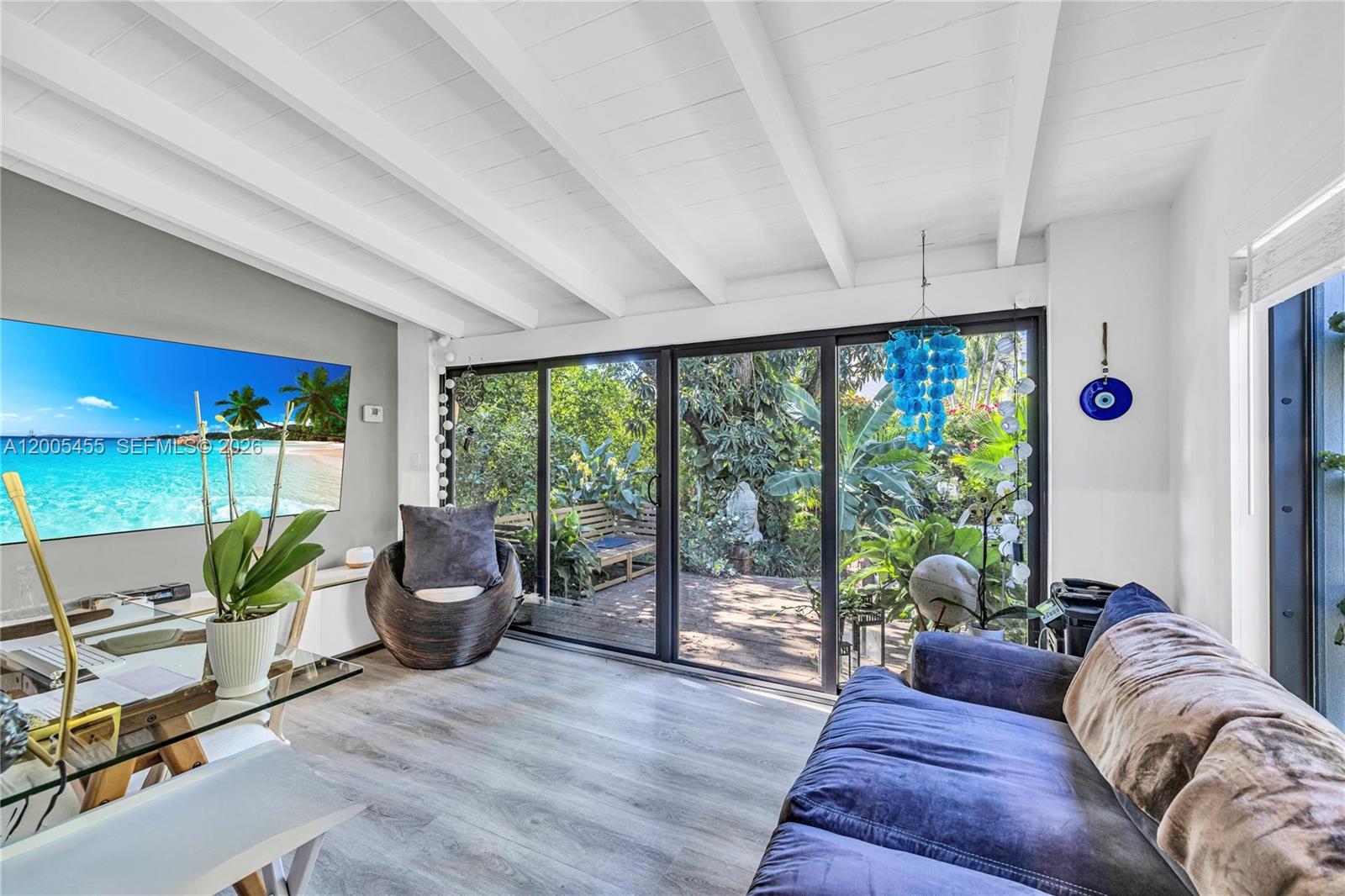 3030 Southwest 2nd Avenue Miami, FL 33129 - Photo 11 of 15 a living room with furniture and a large window