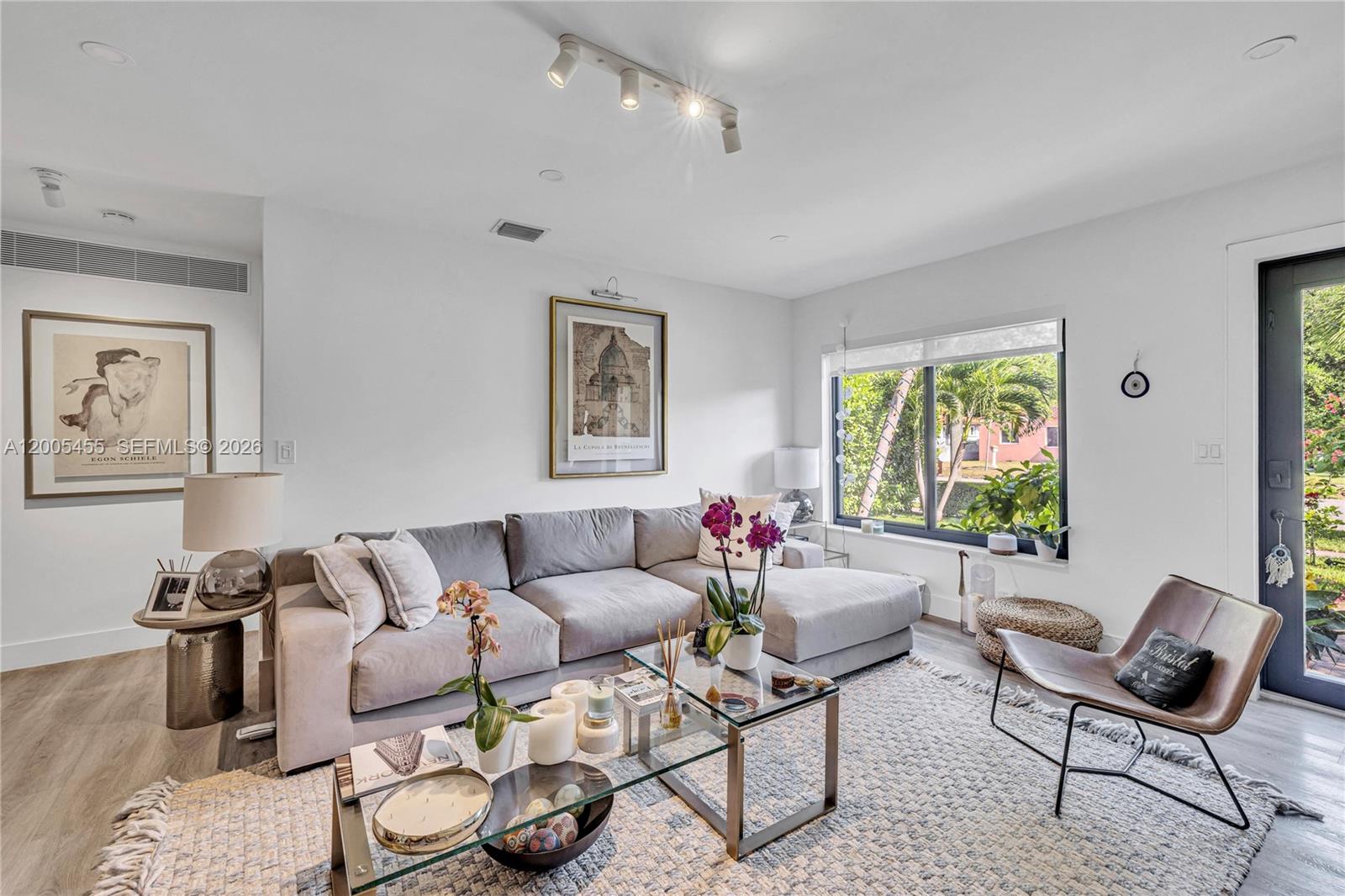 3030 Southwest 2nd Avenue Miami, FL 33129 - Photo 2 of 15 a living room with furniture and a window