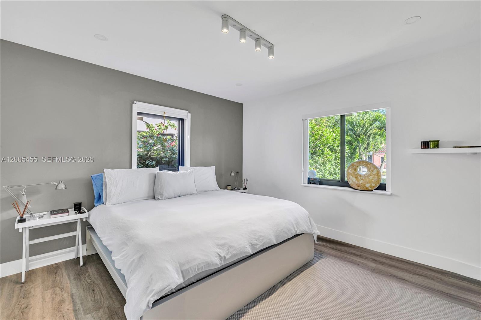 3030 Southwest 2nd Avenue Miami, FL 33129 - Photo 7 of 15 a bedroom with a bed and a window