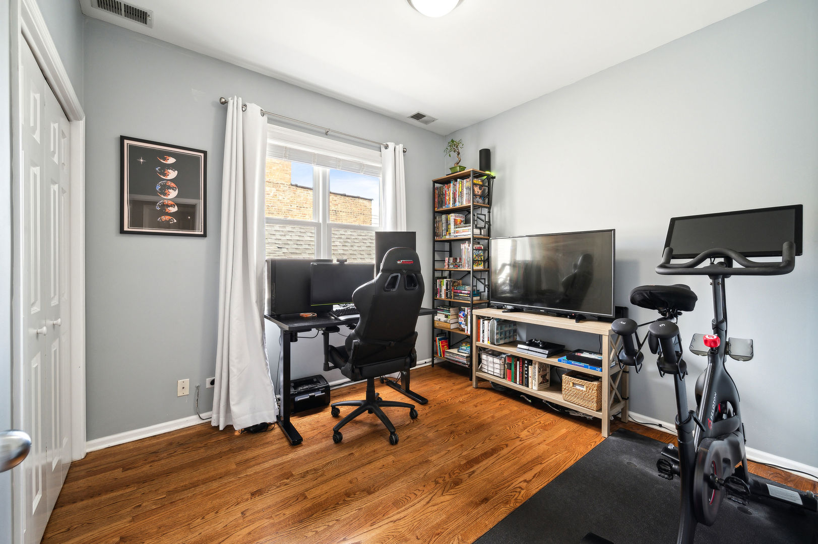 3223 North Seminary Avenue, Unit 3 Chicago, IL 60657 - Photo 13 of 17 a view of a livingroom with workspace and a window