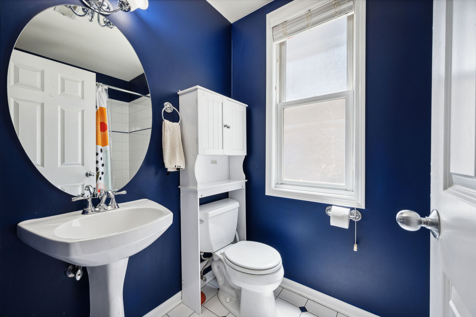 3223 North Seminary Avenue, Unit 3 Chicago, IL 60657 - Photo 14 of 17 a bathroom with a toilet sink and mirror