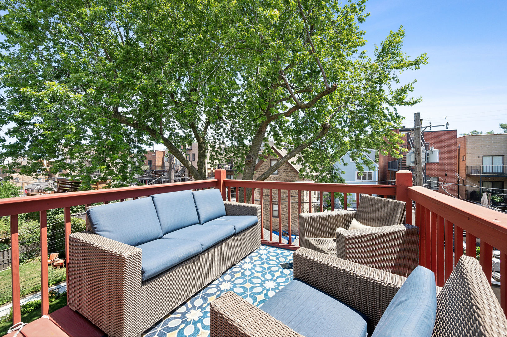 3223 North Seminary Avenue, Unit 3 Chicago, IL 60657 - Photo 15 of 17 a balcony with wooden floor and outdoor seating