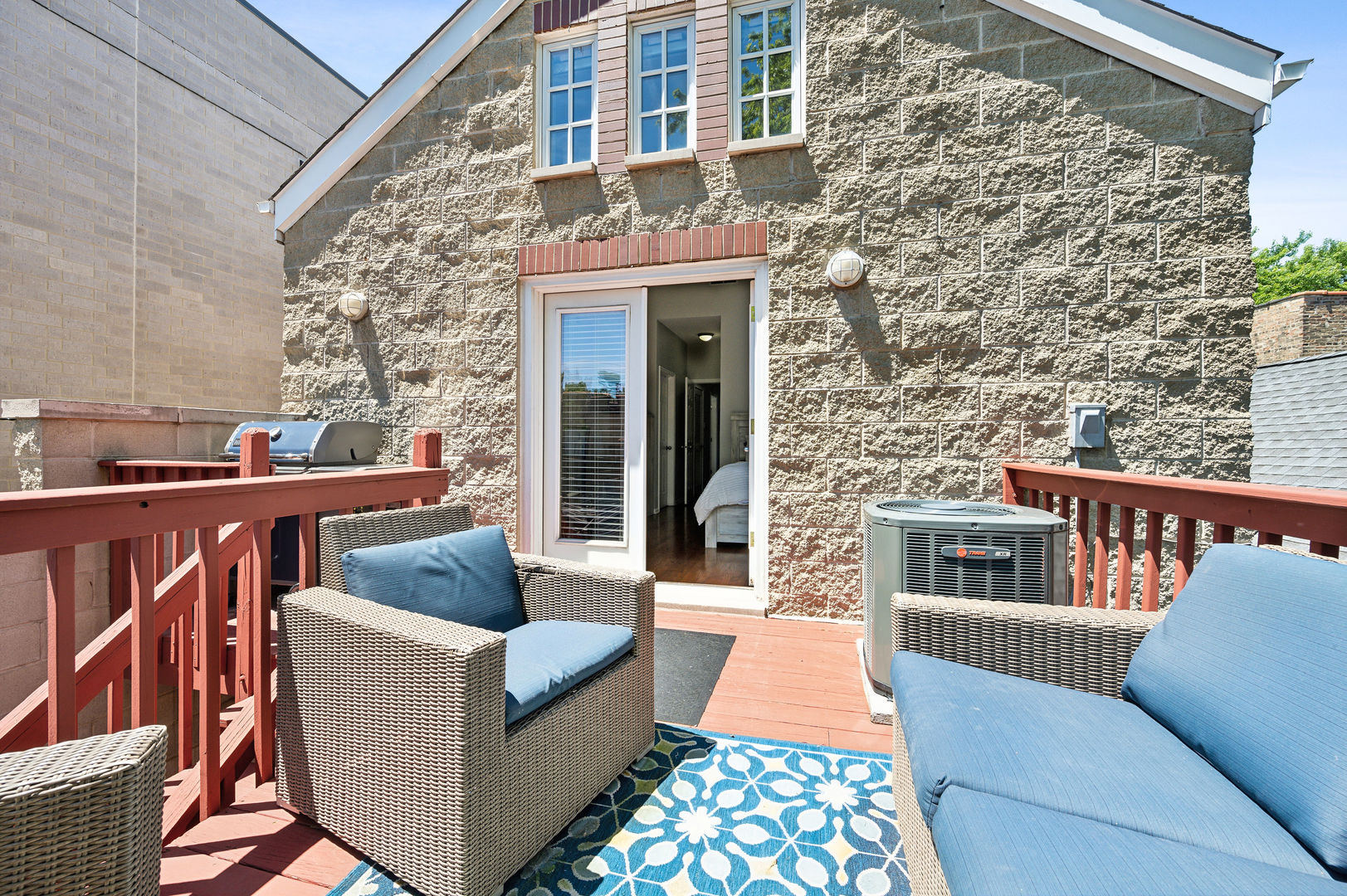 3223 North Seminary Avenue, Unit 3 Chicago, IL 60657 - Photo 16 of 17 a balcony with furniture and a fireplace