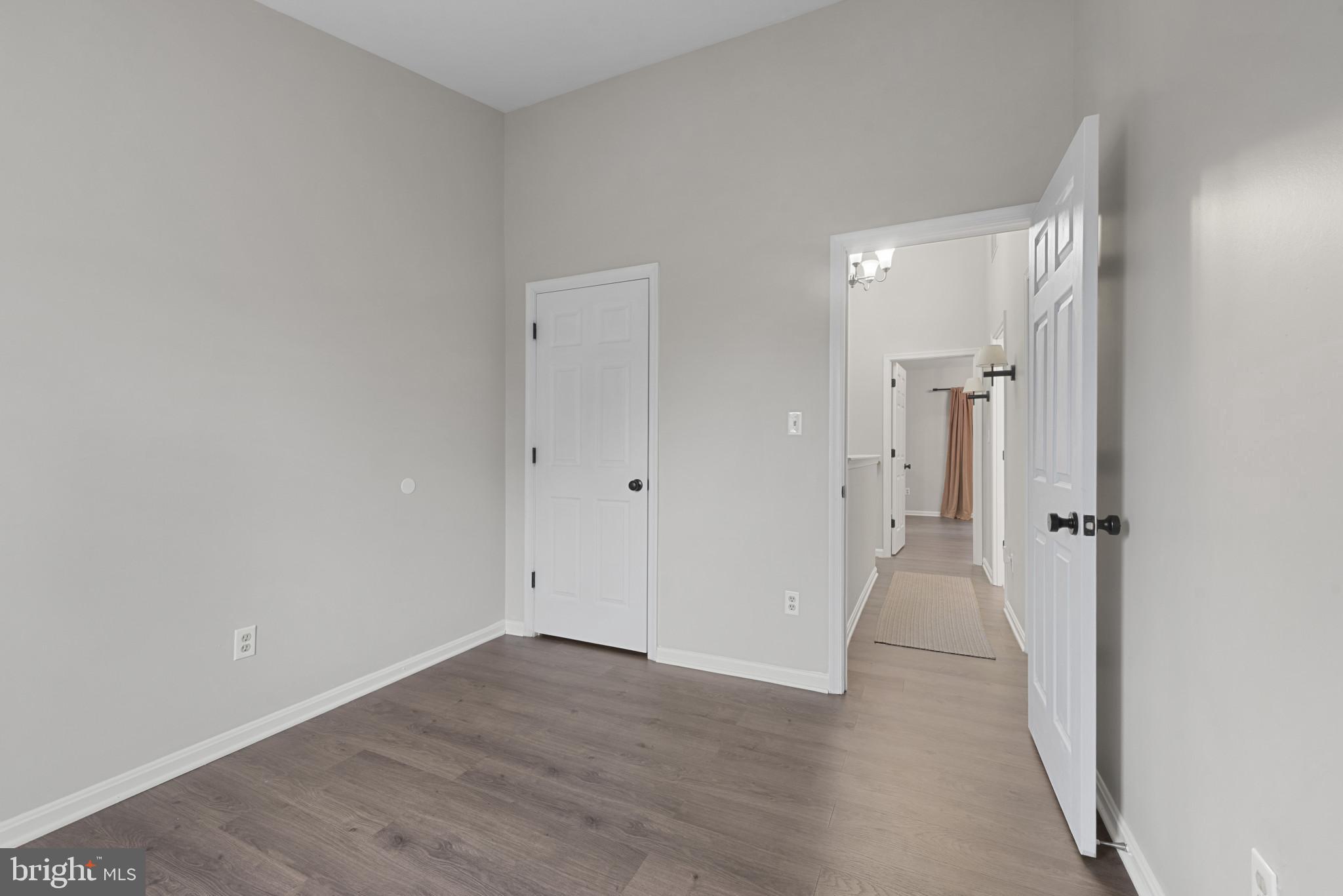 4201 Star Randallstown, MD 21133 - Photo 11 of 30 a view of a hallway with wooden floor