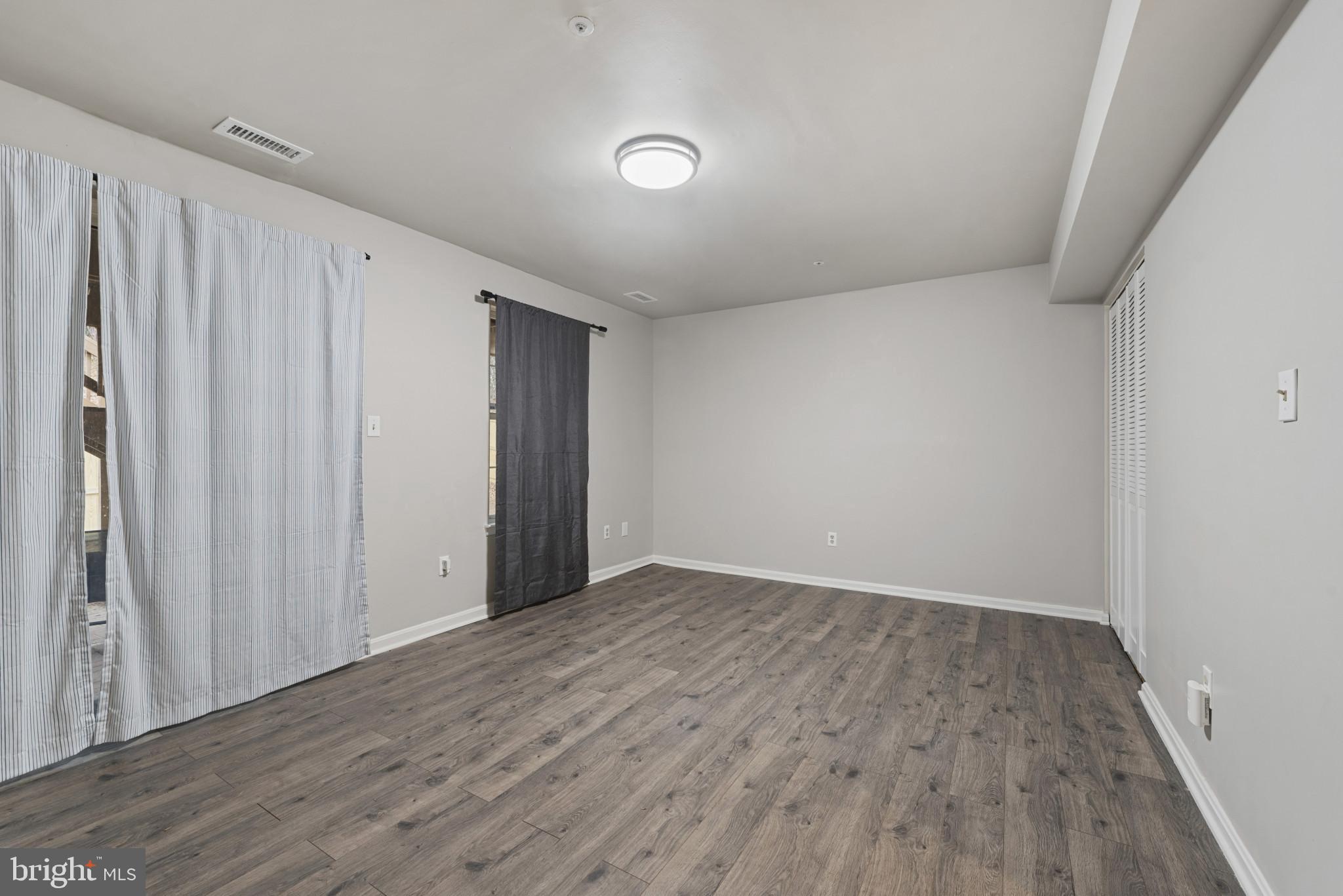 4201 Star Randallstown, MD 21133 - Photo 20 of 30 a view of an empty room with wooden floor