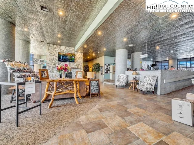 a bathroom with a bathtub and window